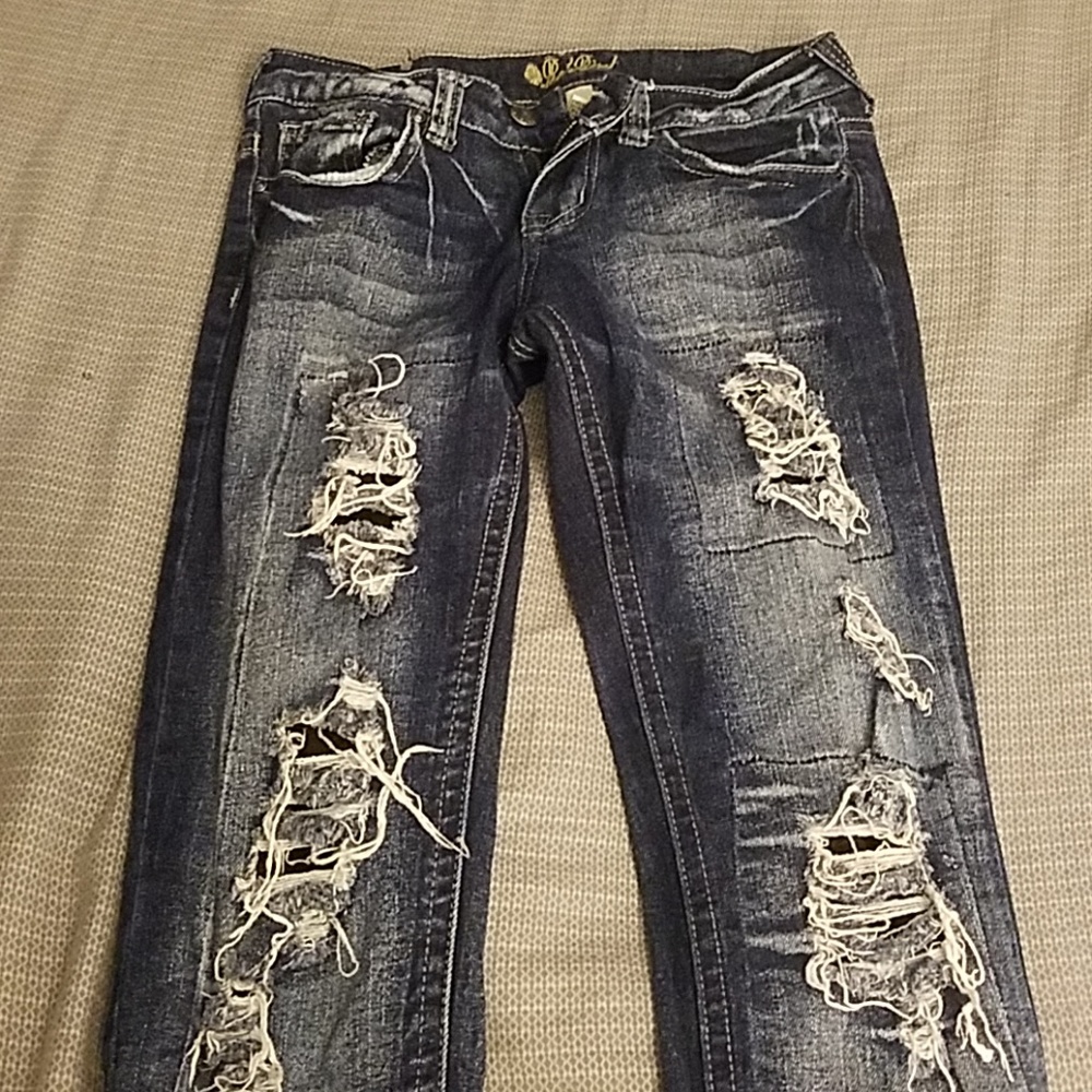 Juniors holey skinny jeans